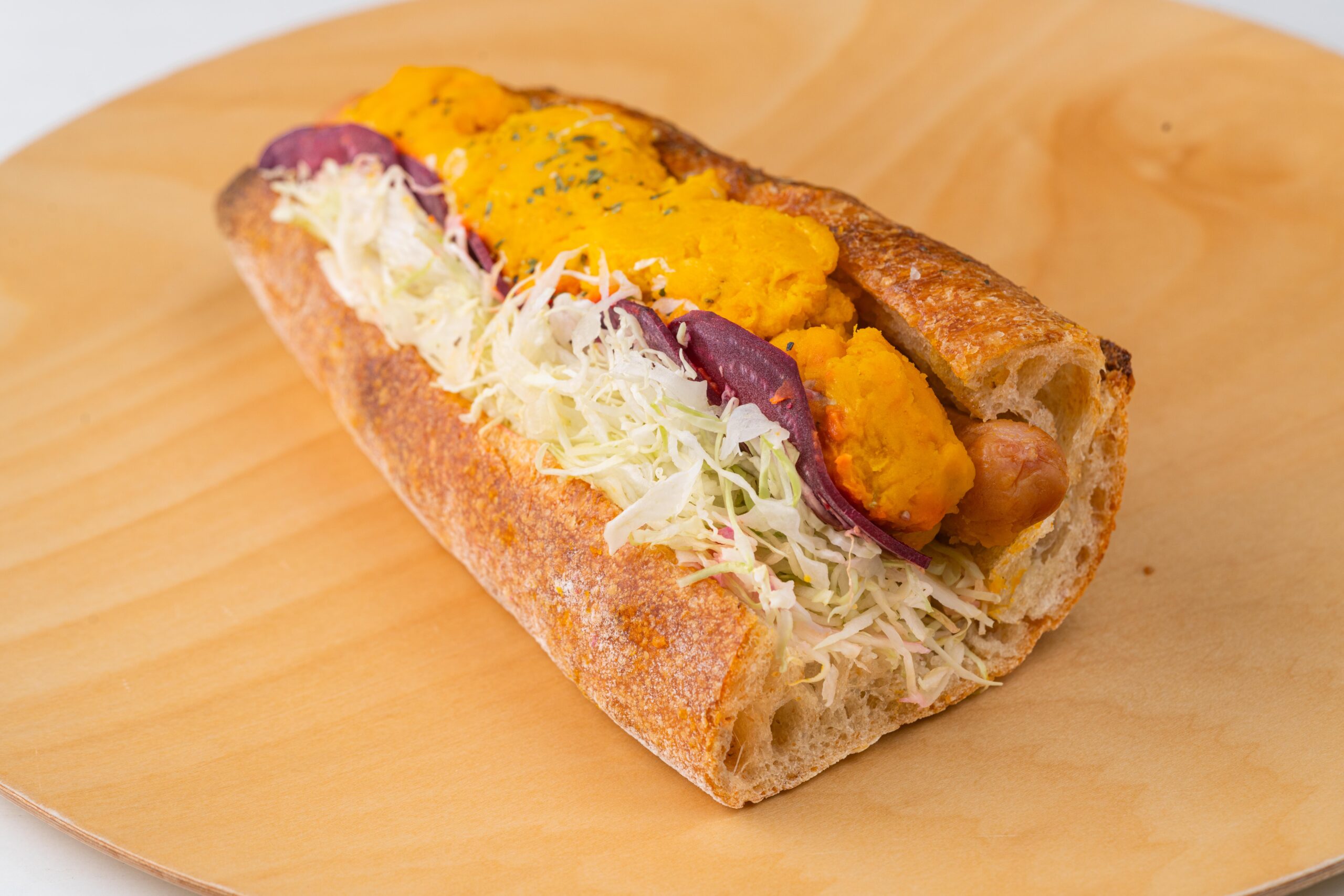 秋野菜とウインナーのバゲットサンドの画像
